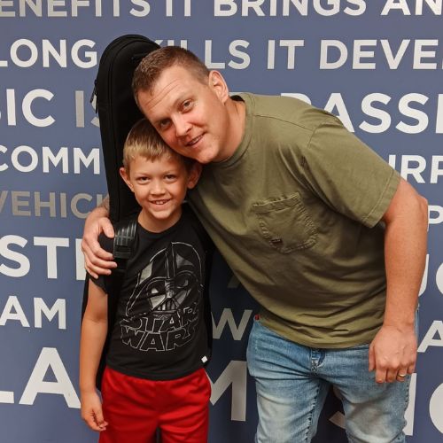 guitar student and his dad